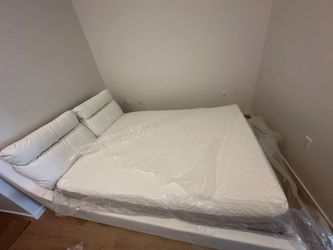 Queen bed with mattresses