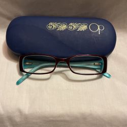 Woman’s Op Prescription eyeglass frames, with the case