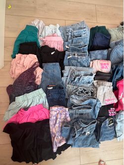 Lots of girls clothes size 10-12