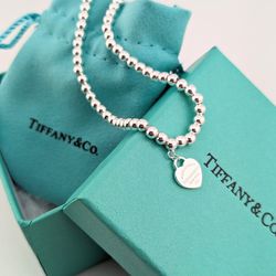 Return To Tiffany & Co. Silver Mini Heart 4mm Bead 7.5" Bracelet