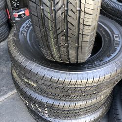 SET OF FOUR TIRES 245/75/17 BRIDGESTONE DULER SEMI NEW 95%TREAD LIFE 