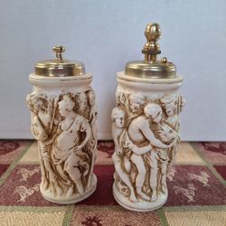 VINTAGE BAS RELIEF ITALIAN SALT & PEPPER SHAKERS 