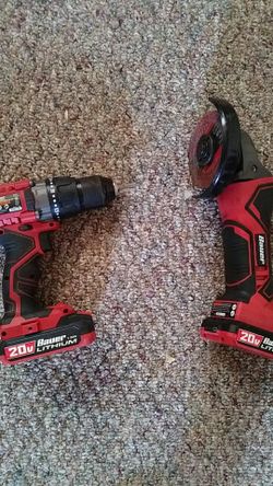 Cordless drill , grinder , charger and two packs