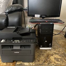 Desktop Computer With Screen And Laser Printer