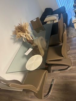 Glass Pedestal Base Dining Table