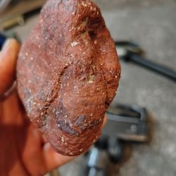 Burnt orange rocker and recliner from Berkline.