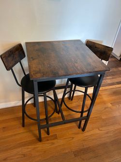 Square bistro table with two chairs