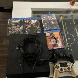 Used PS4 With 4 Games