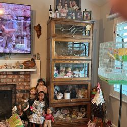 Old-fashioned pie cabinet used as a curio cabinet five shelves let glass at top