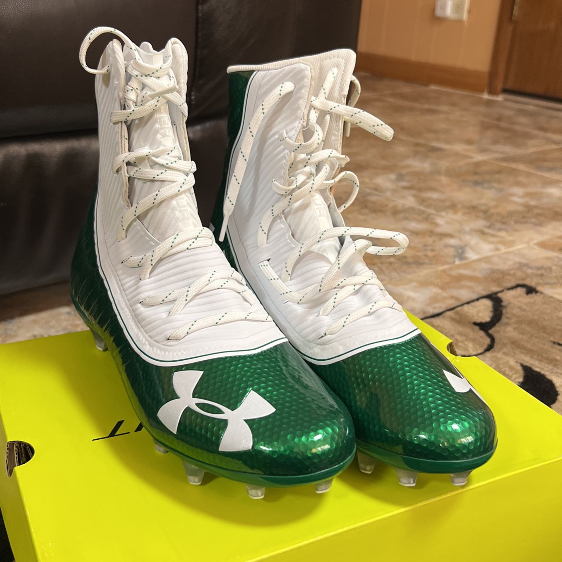 Green and white under armour highlight on sale cleats