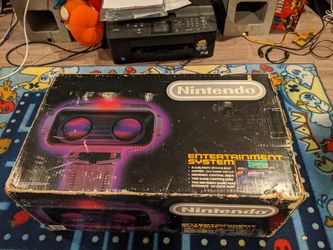 Original Nintendo (NES) Console Deluxe Set - ROB the robot, 2 controllers. Comes with some of the paperwork, rob the robot, nintendo nes hook ups, sty