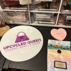 Pink Gucci GWP mirror with pouch