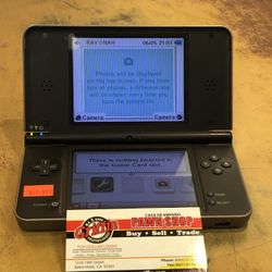 Nintendo DSI XL Handheld System (Few Scratches)
