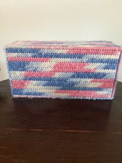 Door stop - a brick covered with plastic canvas and yarn