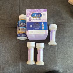 9 Enfamil Ready To Use Bottles And 1 Similac