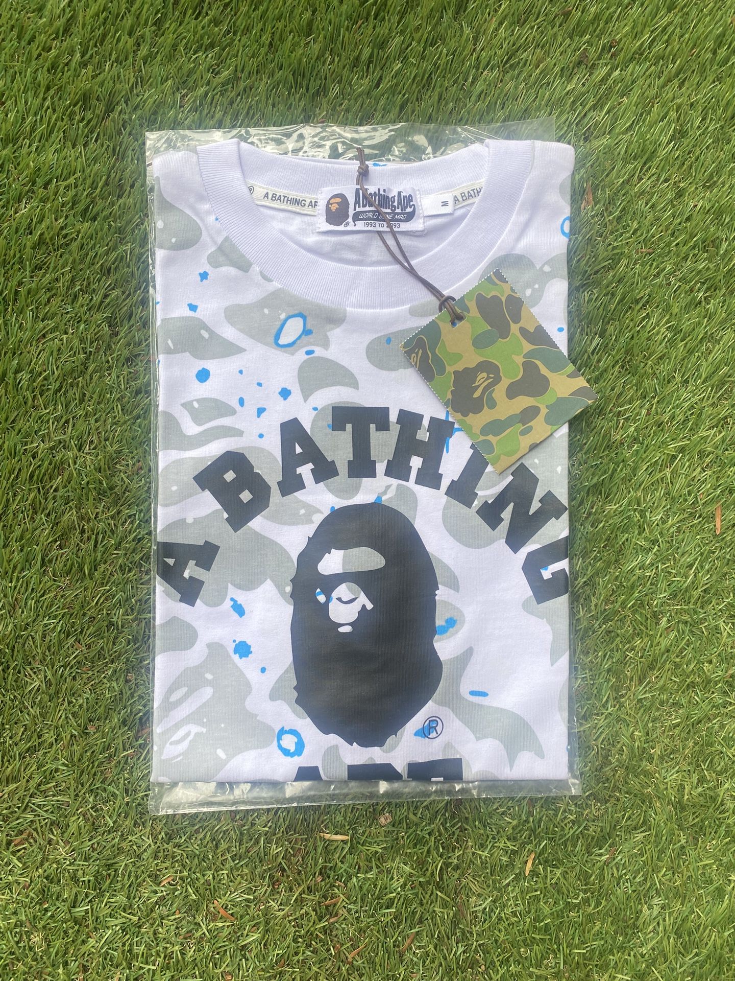 White and Baby blue bape shirt Size medium🌀