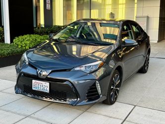 2017 Toyota Corolla SE Sport 57,759 Miles • Rebuilt Title • Excellent Condition  Beautiful Blue Metallic Corolla SE with only 57k original miles. This