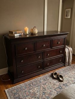 Very strong dresser with 7 drawers and all the drawers work good, structurally very sound, few niks