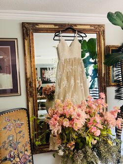 Small antique lace designer wedding gown