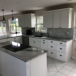 Kitchen Countertop Granite  , Wood Cabinet . Bathroom Vanity 