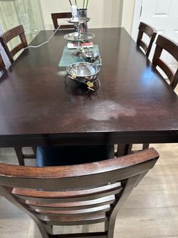 Dining room from Ashley dining room table with six chairs almost new