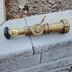Solid brass fireman hose nozzle