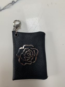 Black leather credit, ID card, cash wallet and can also Connect to key chain. 