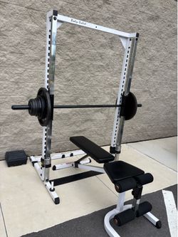 Squat Rack, Weights and Bench. Exercise Equipment
