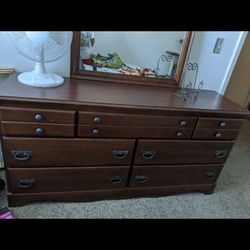Brown Dresser With Six Drawers With Mirror