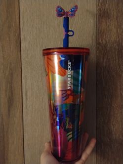 Starbucks cup with topper