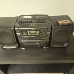 TV stand and JVC CD player