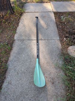 Stand-up paddleboarding paddle, adjustable