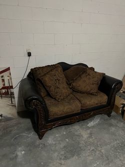 Traditional Loveseat with Carved Wood Frame