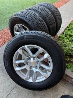 Like new Chevy Silverado Rims and tires Yukon sierra Denali rims