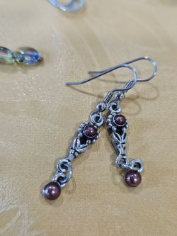 8 dangly earrings, some sterling, mixed.