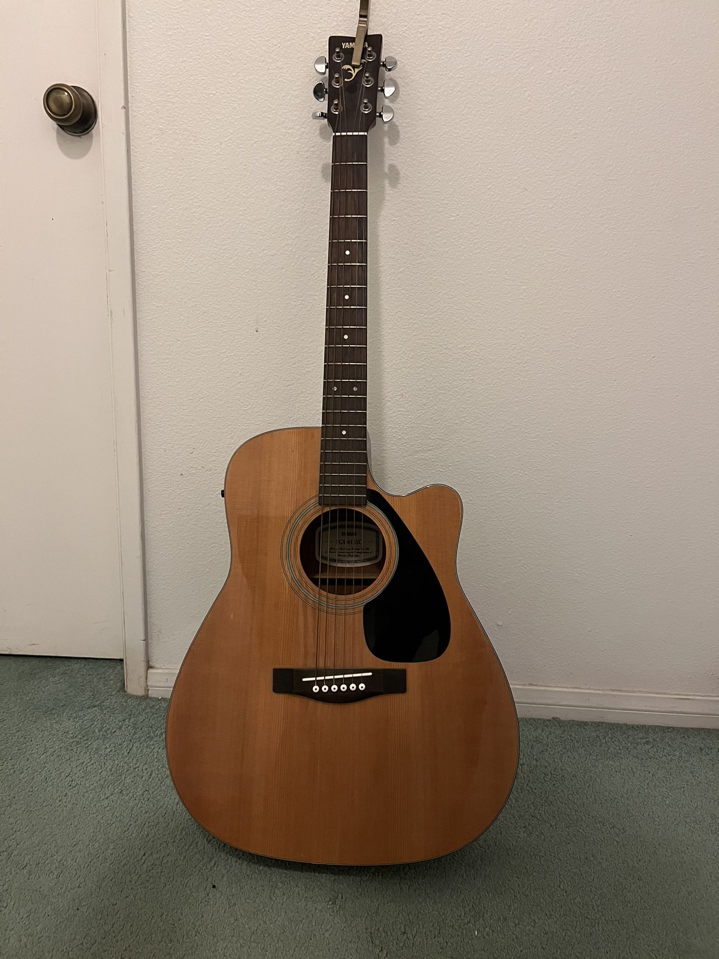 Yamaha Guitar with Capo