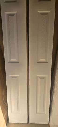 24 in. x 80 in. Textured 6-Panel Primed Hollow Core Composite Bi-fold Interior Door