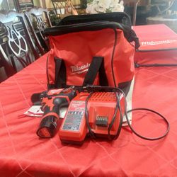 Milwaukee  M12 Drill Battery Charger And Bag  95.00 