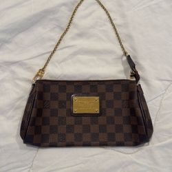 Louis Vuitton Eva Clutch in the Damier Ebene canvas 2013