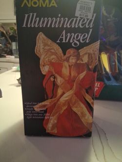 Noma Illuminated Angel Tree Topper
This is a vintage Noma illuminated angel tree topper, featuring a beautifully sculpted resin head and shimmering go