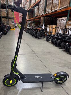 Electric scooter with shock absorption
