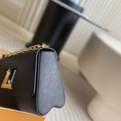 Louis Vuitton Twist Traveler Bag