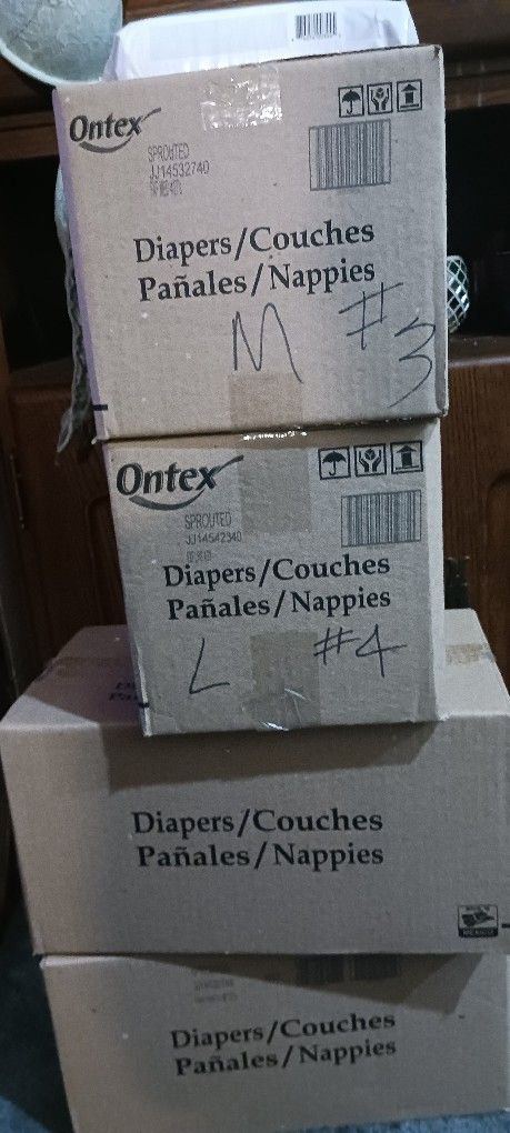 Baby Diapers One Large Three Medium Boxes