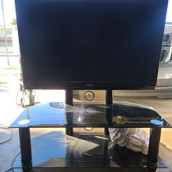  Sharp Flat Screen With Table 