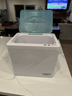 Sharper image towel warmer