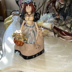 Antique doll figurine 