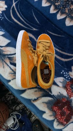 Orange Pumas Size 10