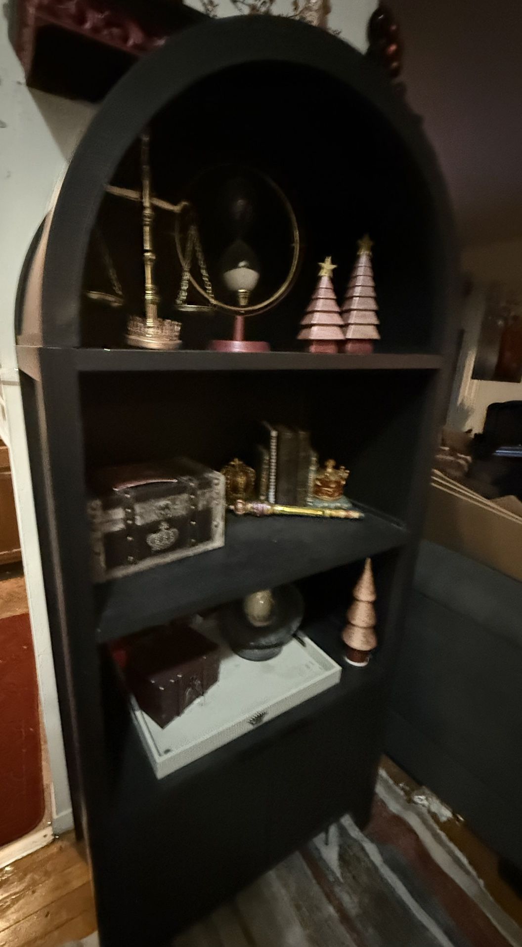 Arched Black Cabinet With Open Shelving And Closed Storage