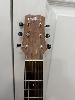 Cordoba classic guitar Mini-O Nylon strings classical guitar with case .