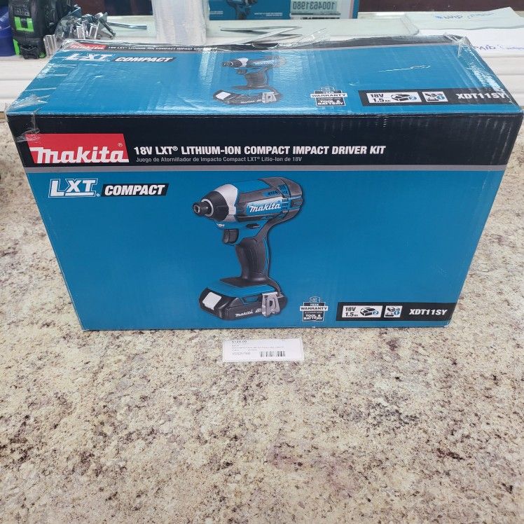 Makita Impact Driver With Two Batteries And Charger